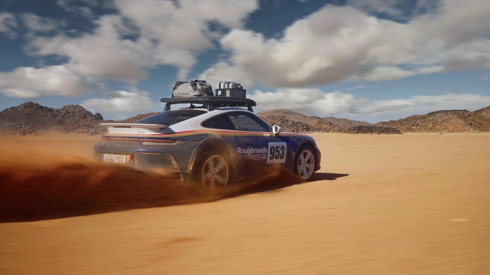 Porsche 911 Dakar ajamassa aavikolla