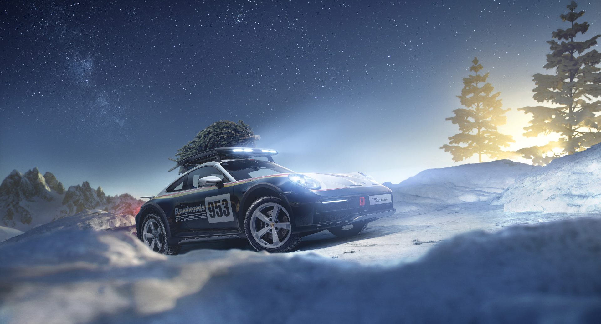 Porsche 911 Dakar jouluisissa talvimaisemissa.